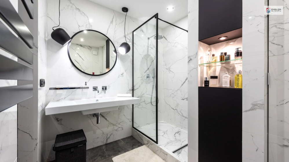 A Black and White Bathroom with a Charcoal Transition